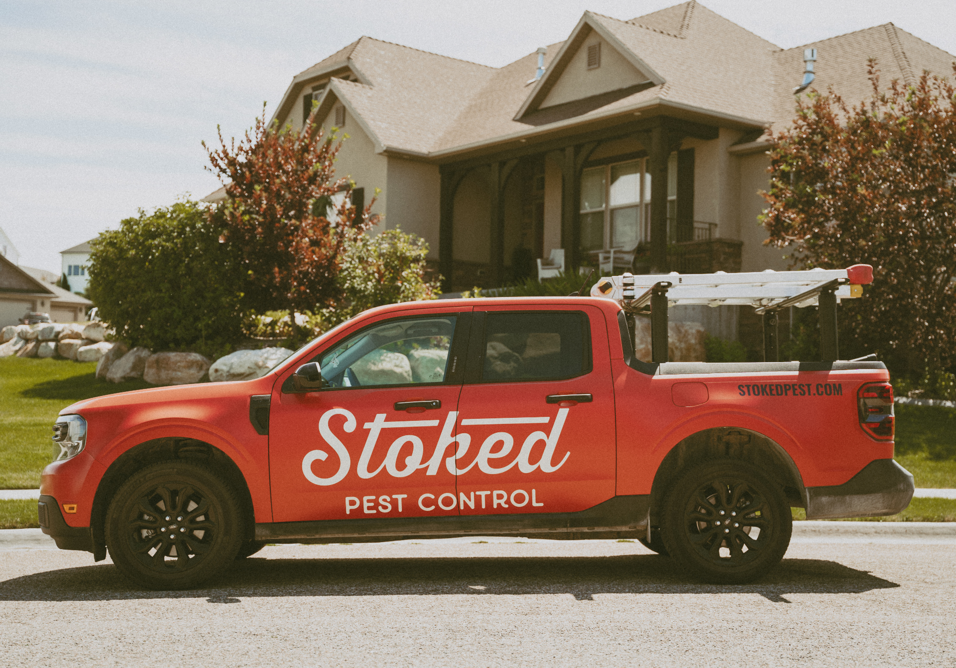 Stoked Pest Control truck on an Eastern Idaho street