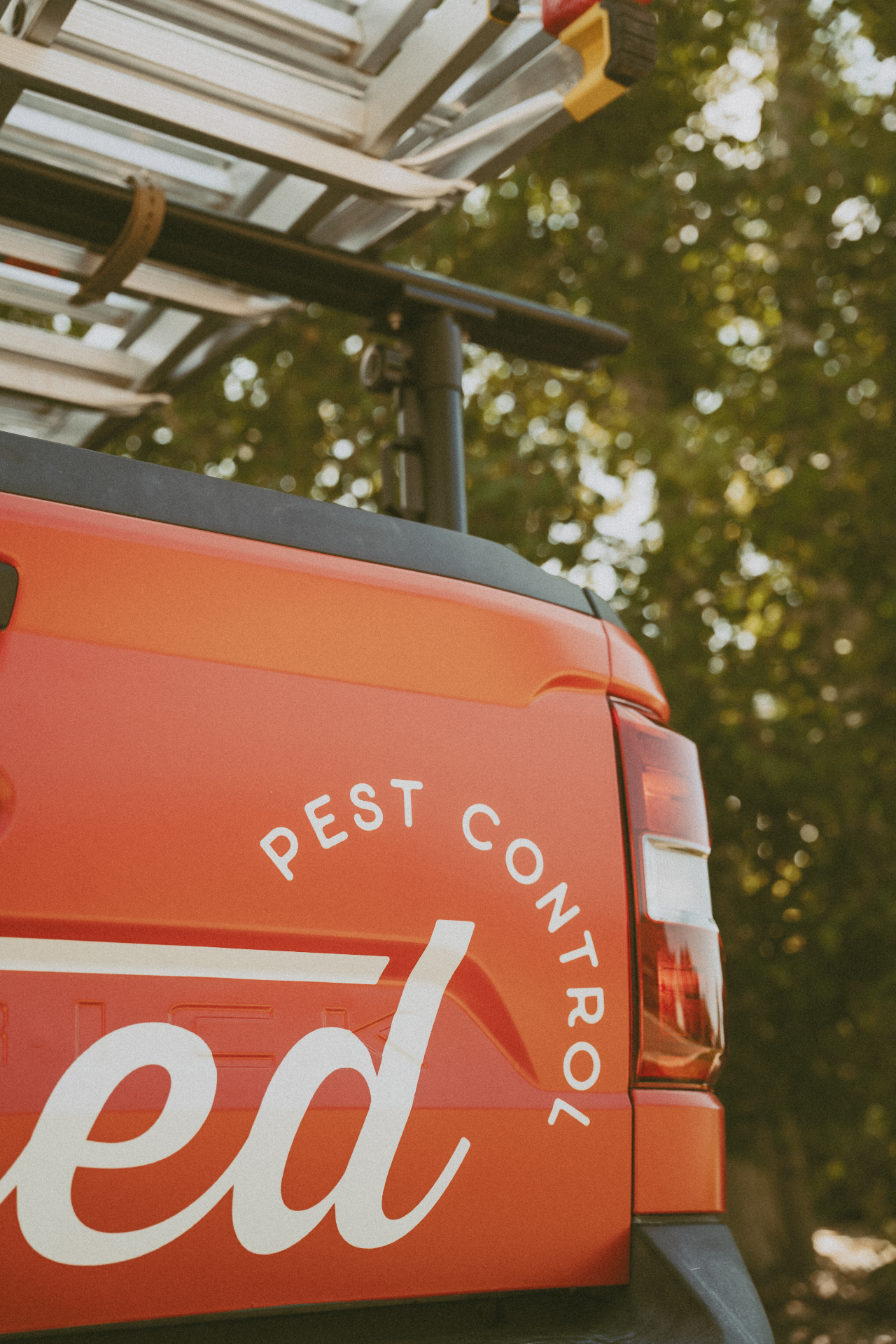 Stoked Pest Control truck up close